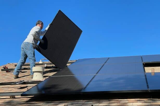 man in white dress shirt and blue denim jeans sitting on white and black solar panel